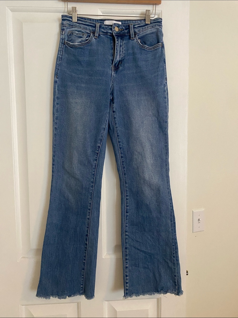 Mid Wash Blue Flare Jeans with Frayed Hem